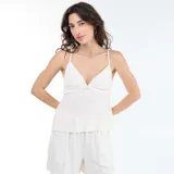 Top de tirantes de lino mezclado, color blanco, con escote en V y diseño holgado.