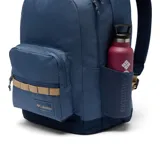 Mochila urbana Columbia de 30 litros, color azul oscuro con detalles en beige. Cuenta con dos compartimentos principales, funda acolchada para laptop, bolsillos laterales para botellas y base plana reforzada.
