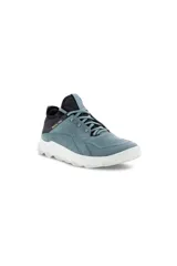 Zapatilla deportiva Ecco MX M Trooper, color azul verdoso (teal) con detalles en negro y suela blanca gruesa y ondulada. Presenta un diseño moderno con cordones rápidos y tecnología BREATHRU.