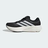 Championes de running Adidas Supernova Rise 3, color negro con las tres tiras laterales en blanco y mediasuela de amortiguación Dreamstrike+ en tono crema. Confeccionados con exterior de tela técnica Primeweave y suela de caucho Lighttraxion.