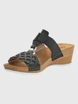 Sandalias Hush Puppies negras con plataforma de cuña y ajuste con velcro.