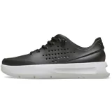 Championes Crocs modelo InMotion Pacer, de color lila con suela blanca. Cuentan con diseño de cordones elásticos y perforaciones laterales para mayor ventilación.
