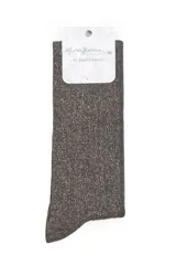Calcetines de caña alta con acabado brillante de glitter, confeccionados en una mezcla de algodón y fibras metalizadas.