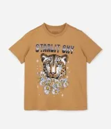 Remera alargada de algodón color ocre, con cuello redondo y mangas cortas. Presenta un estampado de la cara de un leopardo rodeada de flores y la frase "Starlit Sky".