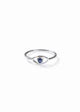 Anillo de plata 925 con diseño de ojo turco calado y una zirconia azul engastada en el centro.