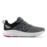 Championes New Balance 460 de hombre, color gris con detalles en negro y blanco. Presentan el logo de la marca en el lateral y suela con detalles en rojo.