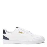 Championes Puma modelo Shuffle, de diseño urbano con silueta de bota baja. Presentan una parte superior de cuero sintético negro con la clásica franja lateral de la marca en color blanco y logo dorado. Incluyen plantilla SoftFoam+ para mayor amortiguación, cierre con cordones y suela de goma blanca.