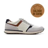 Zapatillas urbanas Hi-Tec Roy de cuero color blanco, con detalles en gris, marrón y azul.