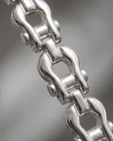 Pulsera de plata 925 con diseño de cadena de eslabones gruesos interconectados.