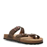 Sandalias de cuero graso color marrón habana, con diseño de dos tiras ajustables con hebillas metálicas y suela anatómica de corcho con base de goma antideslizante.