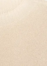 Jersey Klong de punto fino metalizado con lúrex, cuello redondo y manga larga.