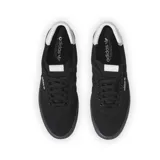 Championes Adidas modelo 3MC de estilo urbano, confeccionados en gamuza negra con suela de goma vulcanizada al tono y detalle de talón en contraste blanco.
