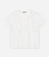 Remera de viscolycra color crudo, de corte regular, con cuello redondo, mangas cortas y apliques de lentejuelas verticales.