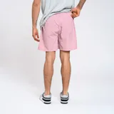 Short de baño azul marino de nylon con cintura elástica y logo de la marca en la pierna.