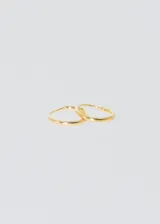 Par de aros tipo argolla de oro amarillo 18k, de 12mm de diámetro y 1.2mm de grosor.
