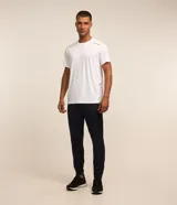 Pantalón deportivo Get Over de color azul marino, con cintura elástica, cordón de ajuste, bolsillos con cremallera, bandas laterales en contraste y cierres en el bajo.