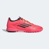 Championes Adidas F50 League para césped sintético, color rosa vibrante con las tres franjas negras. Presentan un diseño ligero con parte superior Fiberskin, estampado Sprintgrid en el antepié y lengüeta elástica.