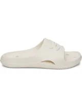Sandalias de una sola pieza moldeadas en EVA, color blanco, con diseño ergonómico, orificios de drenaje y suela texturizada para mayor tracción.