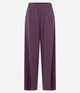 Pantalón deportivo de modal color azul marino, de corte ancho y relajado, con cintura elástica y bolsillos laterales.
