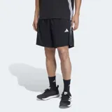 Short deportivo Adidas de corte clásico, color negro con las icónicas tres rayas blancas laterales. Cuenta con cintura elástica, bolsillos laterales con cierre y logo de la marca en la pierna.