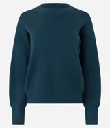 Suéter de punto azul marino, con cuello redondo y manga larga.