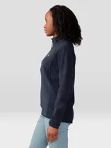 Buzo polar de Mountain Hardwear con cierre frontal de un cuarto, cuello alto, mangas raglán y logo bordado en el pecho.