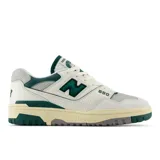 Championes New Balance 550 unisex, color blanco con detalles en verde y gris.