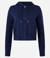 Campera de punto azul marino, con capucha ajustable con cordón, cierre frontal de cremallera y bajo ajustado.