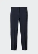 Pantalón skinny crop de tiro medio, color negro, de corte entallado y largo tobillero con trabillas en la cintura.