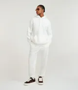 Pantalón jogger de corte holgado con cintura elástica y cordón ajustable. Presenta bolsillos laterales y puños elásticos en los tobillos.