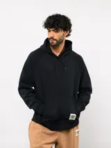 Canguro de felpa color verde menta, con capucha, bolsillo canguro frontal y etiqueta del logo Umbro en la parte delantera.