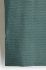 Musculosa deportiva H&M Move de corte estándar, color verde oscuro, con tecnología DryMove para absorción del sudor, cuello redondo y sisas amplias.