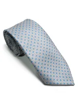 Corbata de seda azul marino con estampado paisley en tonos rosados y blancos.