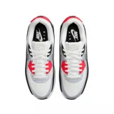 Championes Nike Air Max 90 color rosa con detalles en gris y suela blanca con detalles en marrón.