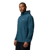 Campera cortaviento Columbia Trailborne Jacket Omni-Shield, color azul, con capucha incorporada, cierre frontal y bolsillos laterales con cremallera. Incorpora tecnología repelente a la humedad y manchas.