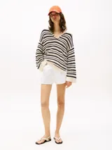 Short de jean blanco de tiro alto y corte acampanado.