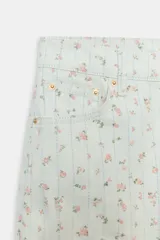 Jeans tiro alto corte tapered de Zara Woman Collection, confeccionados en denim con estampado floral y rayas verticales sutiles. Presenta diseño de cinco bolsillos, trabillas para cinto y cierre frontal con cremallera y botón metálico.