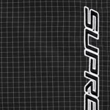 Pantalón deportivo Supreme de corte holgado con diseño de cuadrícula ripstop. Presenta cintura elástica, bolsillos laterales con cierre y cierres verticales en los laterales de las piernas. Incluye el logo de la marca estampado en la pierna izquierda.