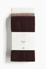 Pack de dos medias can can de punto fino con cintura elástica, una en color bordó y otra en color marrón.