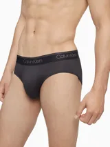 Pack de tres slips negros de microfibra stretch con cintura elástica con logo Calvin Klein.