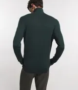 Buzo de corte slim con cuello alto y mangas largas, confeccionado en tejido de punto liso.