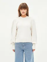 Sweater color verde oliva con cuello redondo y mangas abullonadas.