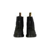 Botas Dr. Martens modelo 1460 Sub Lined, color negro, de caña media con cordones, suela chunky acanalada y tirador trasero característico con inscripción amarilla.