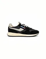 Championes Autry modelo Reelwind Low, de estilo retro inspirado en los runners de los 80. Presentan una combinación de ante negro y malla transpirable, con detalles en color crema y suela amortiguada de goma.