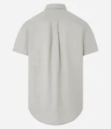 Camisa de lino y algodón color blanco, corte comfort, manga corta, cuello inglés y bolsillo delantero ojal.