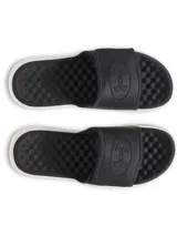 Sandalias tipo ojota Under Armour modelo Ignite Pro 8, con diseño ergonómico. Presentan una correa ajustable negra con logo grabado y una suela gruesa de EVA en color blanco con textura ranurada para mayor tracción y estabilidad.