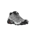 Championes de trail running Salomon Speedcross 6, color gris y negro, con tecnología GORE-TEX impermeables, sistema de cordones quickLACE y suela contagrip con tacos profundos para mayor agarre.