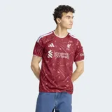 Camiseta de futbol Adidas del Liverpool FC, modelo primera equipacion inspirada en los anos ochenta. Diseno de color bordo con estampado geometrico en tonos claros, detalles blancos en el cuello y las bandas de los hombros, y los logos de la marca y el club en el pecho.