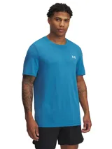Remera deportiva Under Armour Vanish Seamless de manga corta, color azul con textura jaspeada. Presenta un diseño ergonómico sin costuras para reducir la fricción, con zonas de ventilación estratégicas y tejido elástico de secado rápido.
