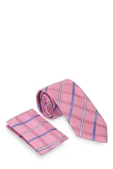 Corbata verde oscuro con estampado floral y pañuelo de bolsillo a juego.